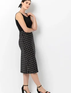 Satin skirt with polka dot pattern