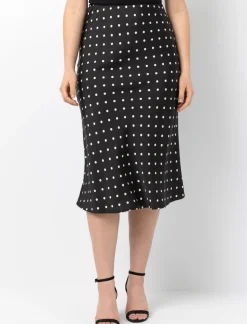Satin skirt with polka dot pattern